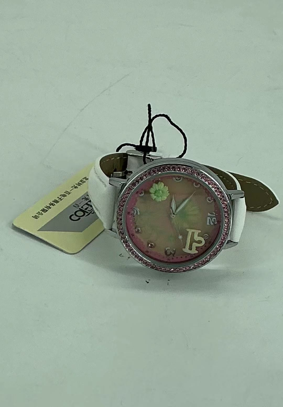 women's watch features a handcrafted miniature 3D floral