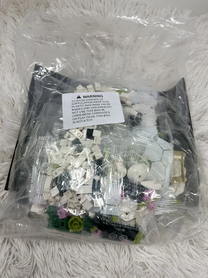QI ZHI LE Orchid Flower building block set, 588 pcs, ages 14+ Instruction book.