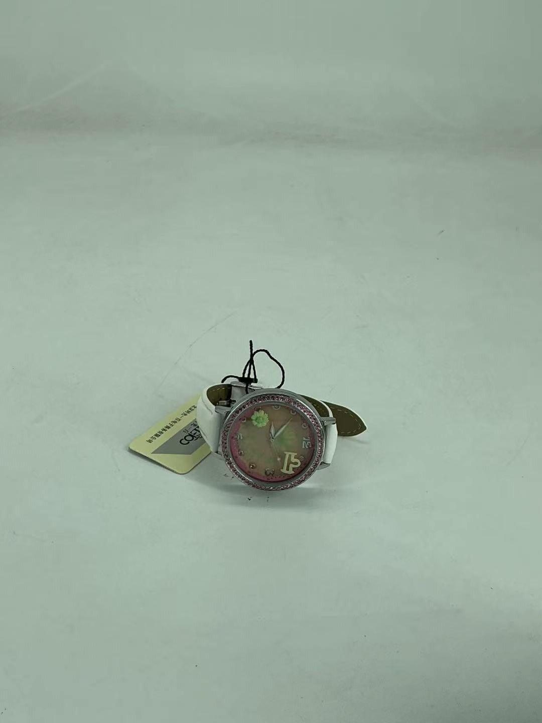 women's watch features a handcrafted miniature 3D floral