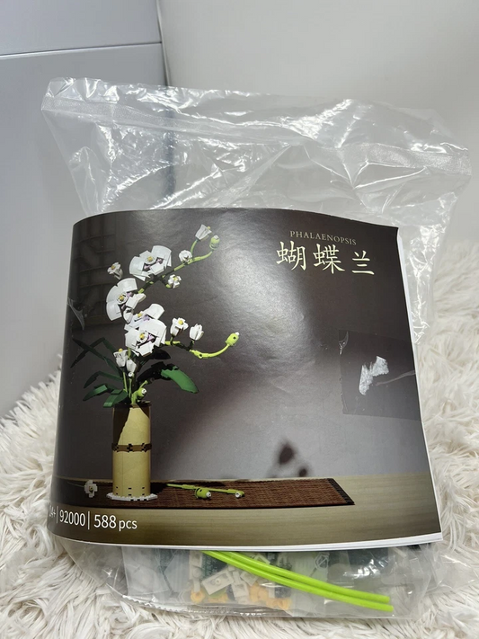 QI ZHI LE Orchid Flower building block set, 588 pcs, ages 14+ Instruction book.