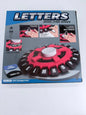 letters WIND-FIRE RINGS
